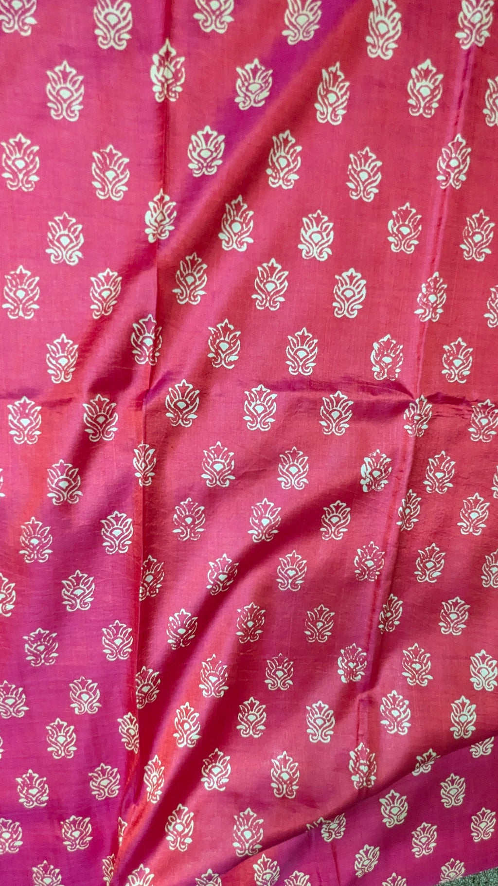Pink pure katan silk saree with white floral patterns, body close-up 
